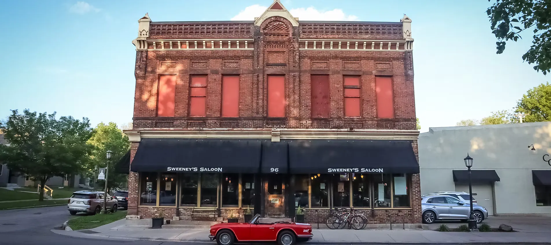 Historic building exterior of Sweeney's Saloon in Saint Paul
